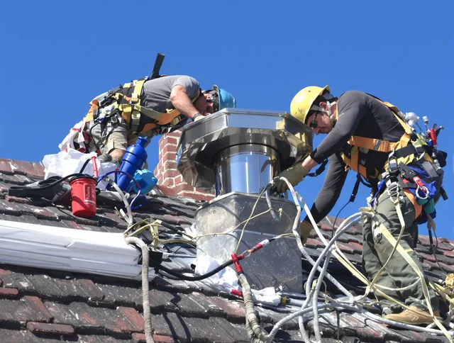 Protective chimney cap installed by Belmont Chimney Sweep in Belmont, NC