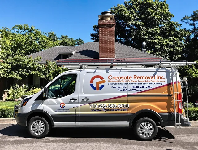 Belmont Chimney Sweep technician removing creosote safely in Belmont, NC